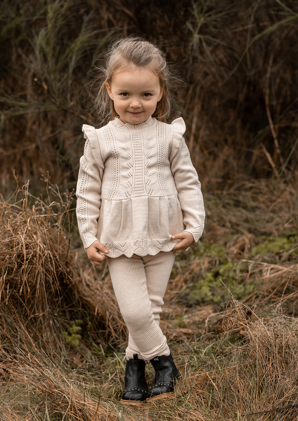 FLIINK ALILLY PEPLUM PULLOVER BLOUSE SANDSHELL