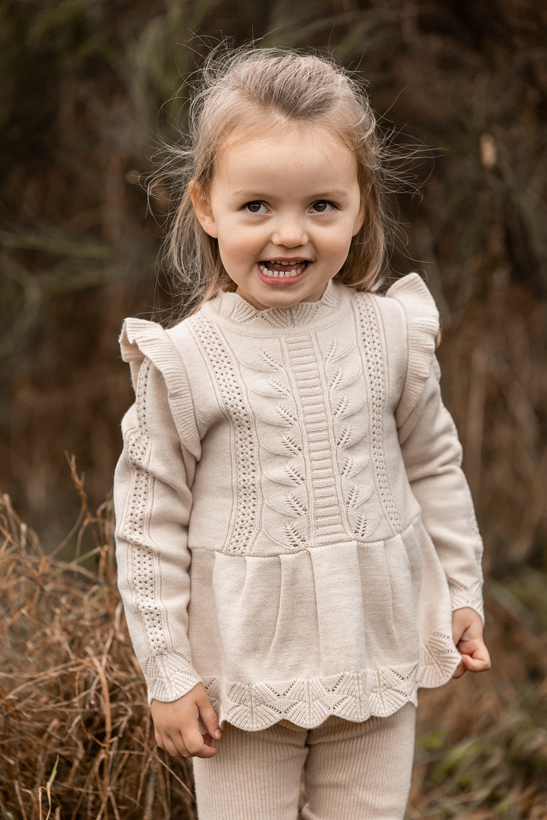 FLIINK ALILLY PEPLUM PULLOVER BLOUSE SANDSHELL