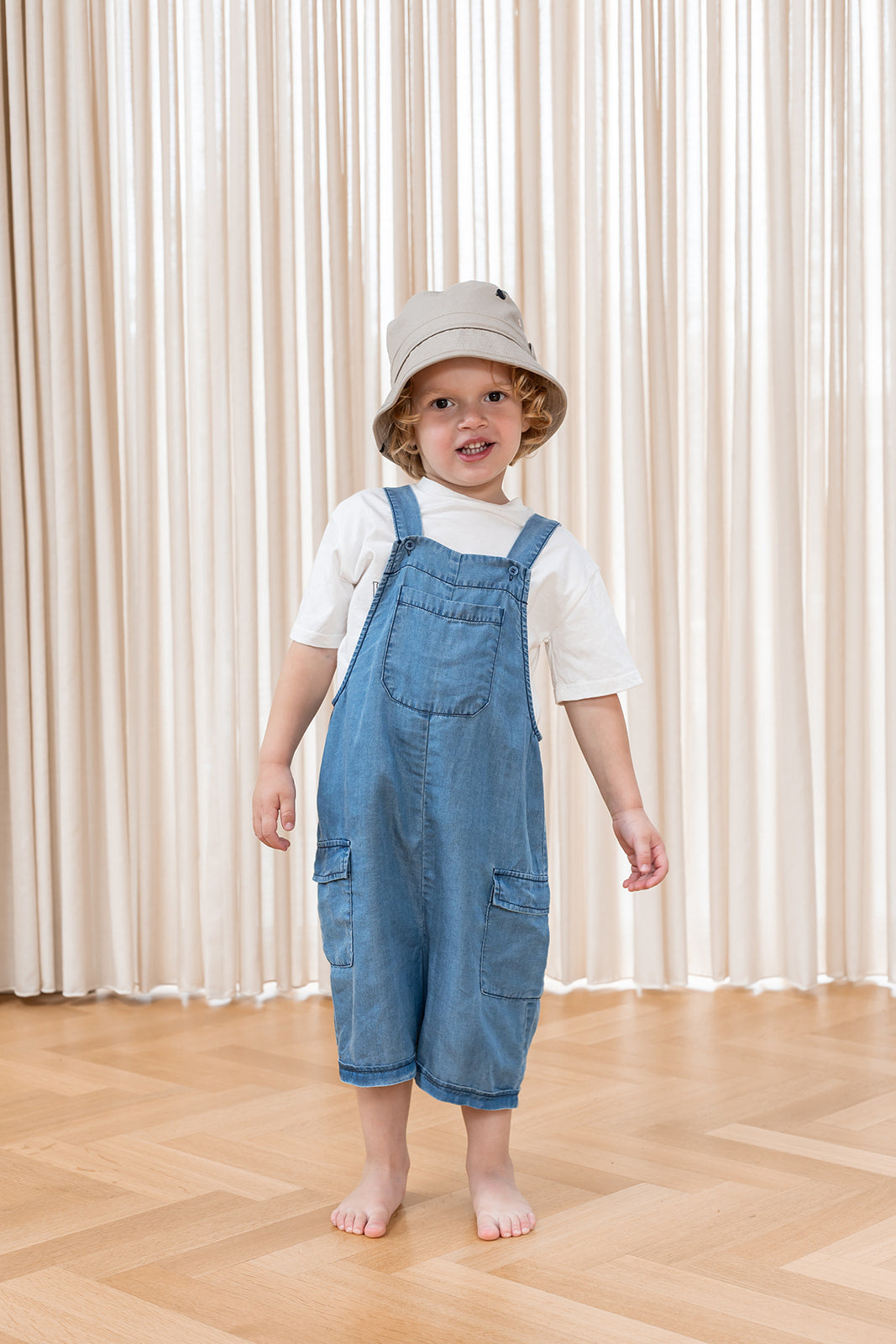 FLIINK HI SHORT OVERALL OVERALL LIGHT DENIM BLUE